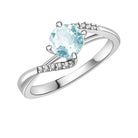 Breathe | Hug Sky Blue Topaz Ring in 18K White Gold - Chakra Energy Co